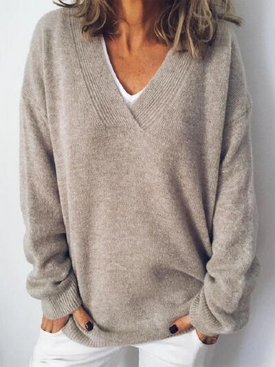 Elegante jersey de punto oversized para mujer con cuello en V