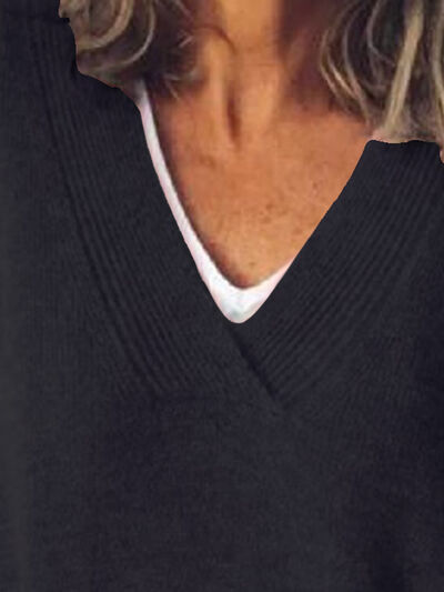 Elegante jersey de punto oversized para mujer con cuello en V