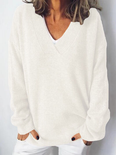 Elegante jersey de punto oversized para mujer con cuello en V