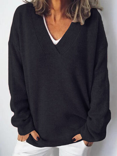 Elegante jersey de punto oversized para mujer con cuello en V