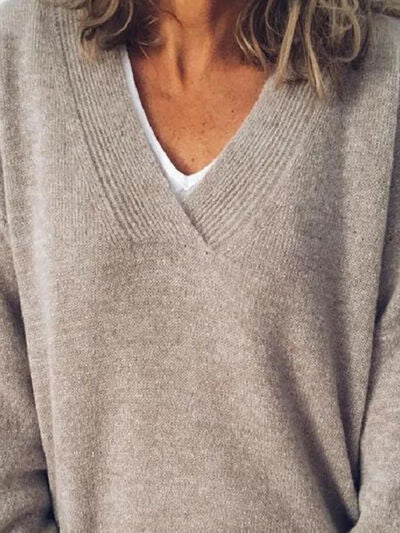 Elegante jersey de punto oversized para mujer con cuello en V