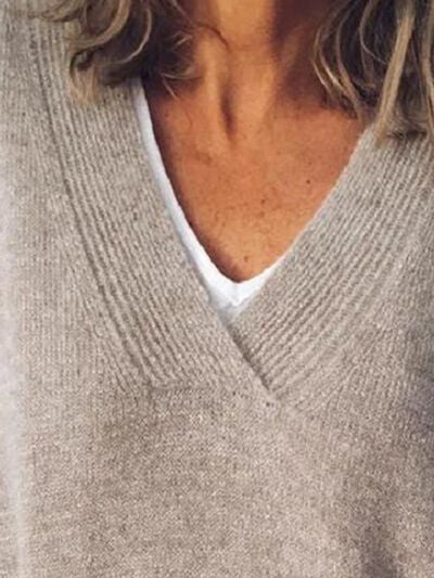 Elegante jersey de punto oversized para mujer con cuello en V