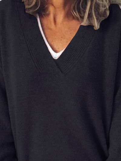 Elegante jersey de punto oversized para mujer con cuello en V