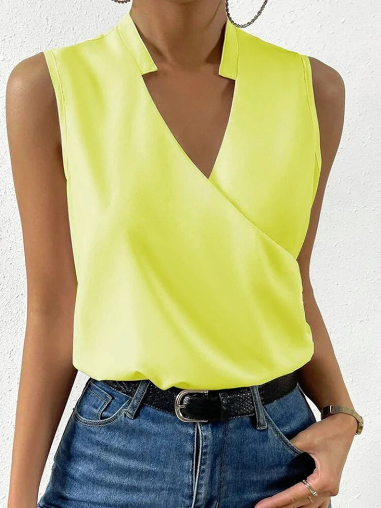 Elegante top floral sin mangas con cuello en V