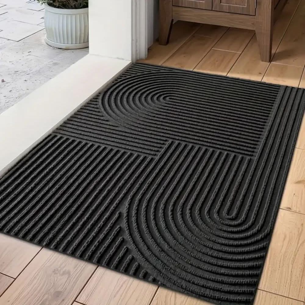 Felpudo de entrada con diseño ondulado, lavable y absorbente