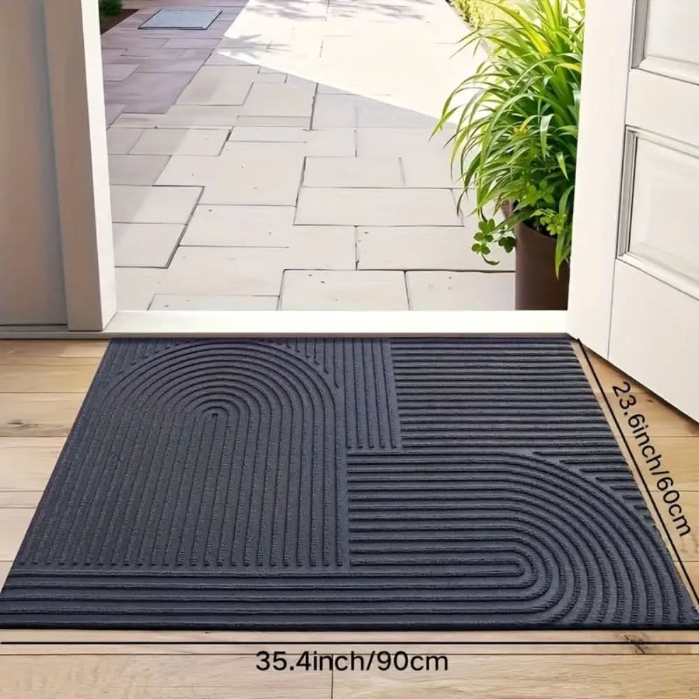 Felpudo de entrada con diseño ondulado, lavable y absorbente