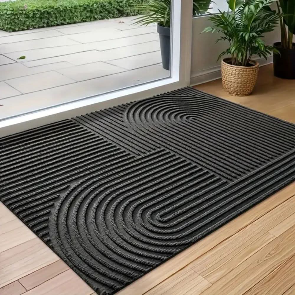 Felpudo de entrada con diseño ondulado, lavable y absorbente