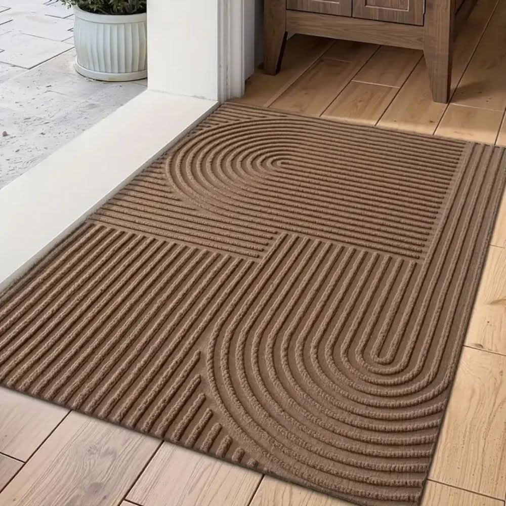 Felpudo de entrada con diseño ondulado, lavable y absorbente