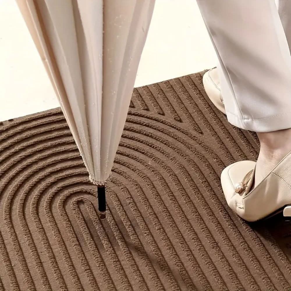 Felpudo de entrada con diseño ondulado, lavable y absorbente