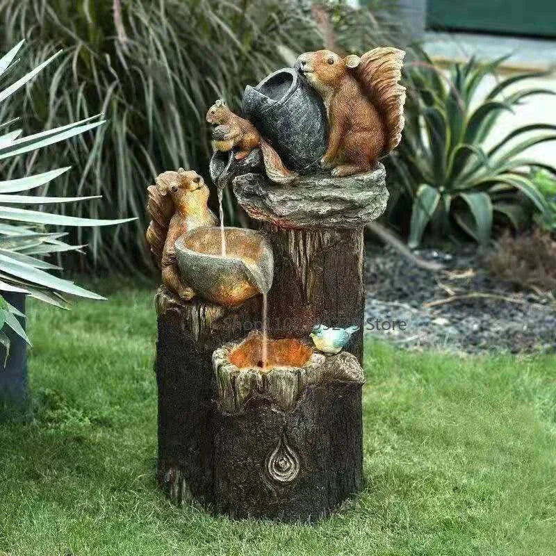 Fuente Decorativa Solar de Pato y Ardilla | Figura de Jardín con Luz LED | Resina Resistente a la Intemperie | Para Terraza y Balcón