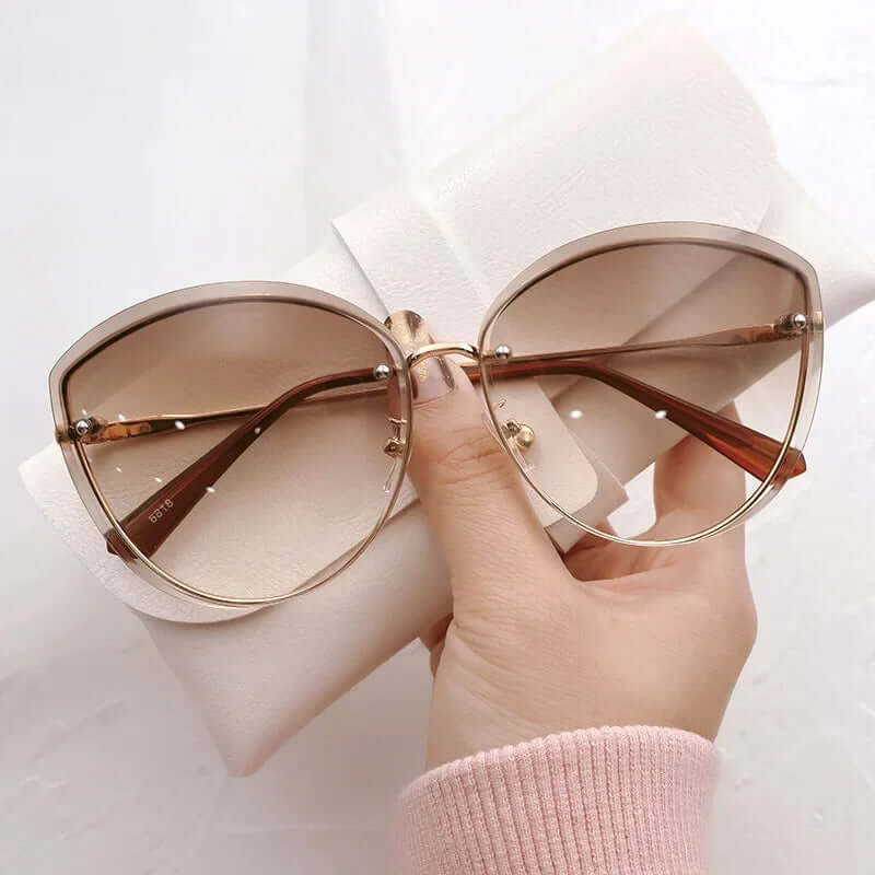 Gafas de sol para mujer sin montura con forma de ojo de gato UV400