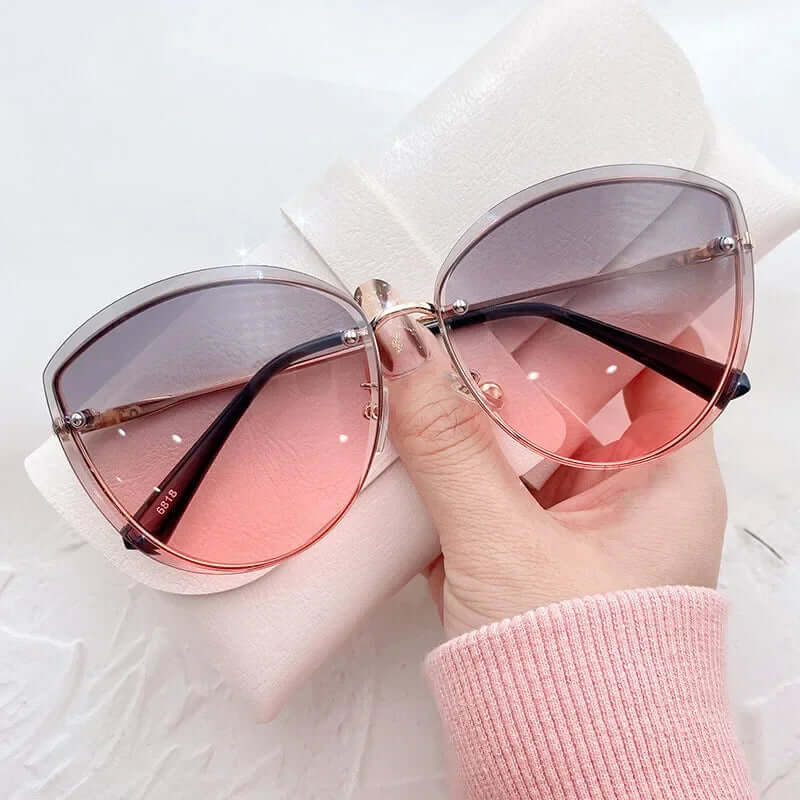 Gafas de sol para mujer sin montura con forma de ojo de gato UV400