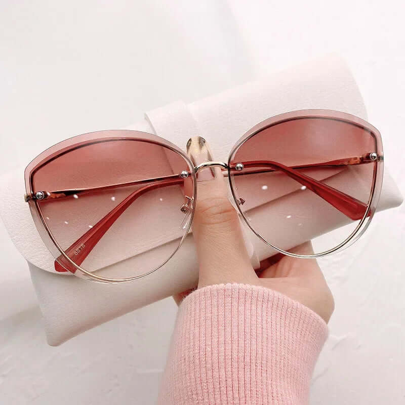 Gafas de sol para mujer sin montura con forma de ojo de gato UV400