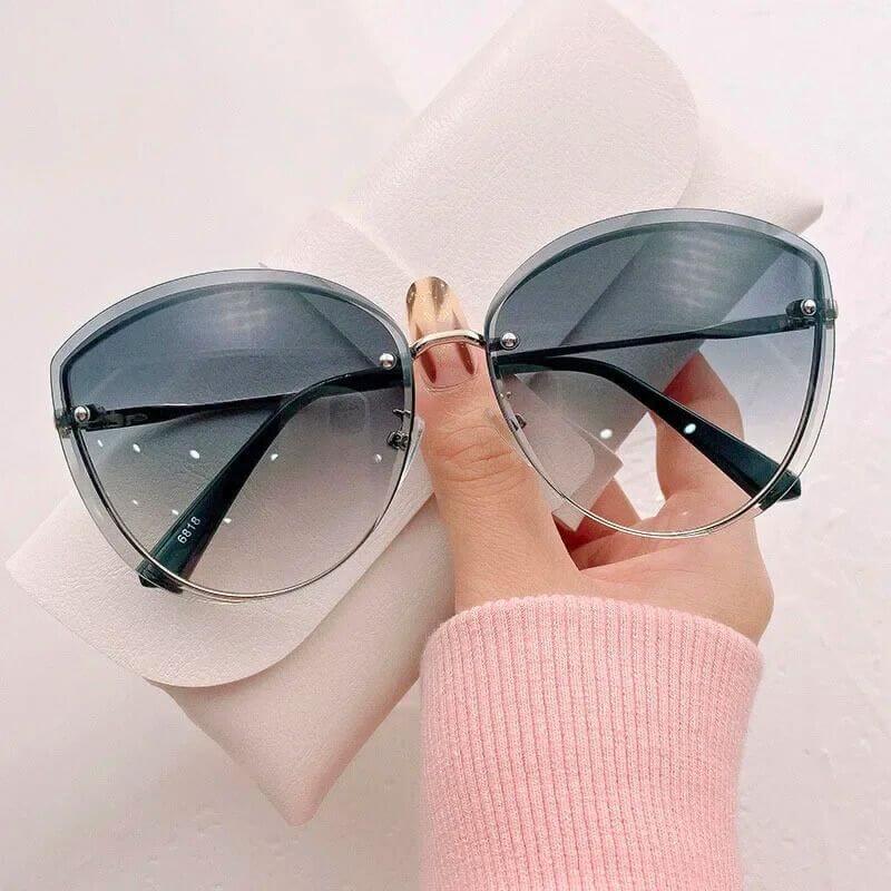 Gafas de sol para mujer sin montura con forma de ojo de gato UV400