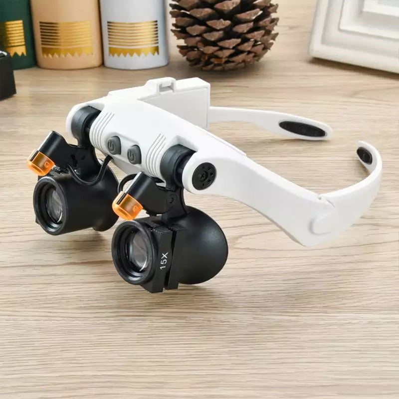 Gafas lupa de joyero tipo diadema con luz LED y 8 lentes