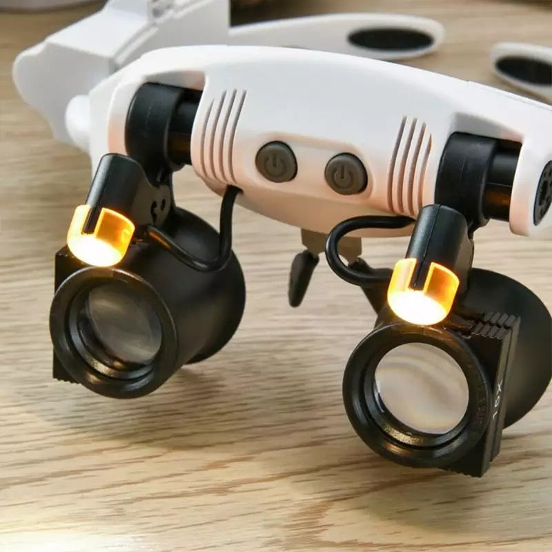 Gafas lupa de joyero tipo diadema con luz LED y 8 lentes