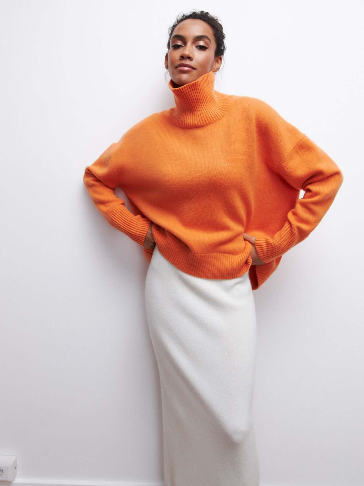 Jersey de punto oversized con cuello alto para mujer