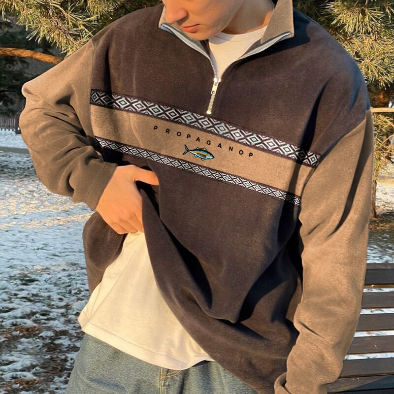 Jersey moderno con cuello alto y media cremallera