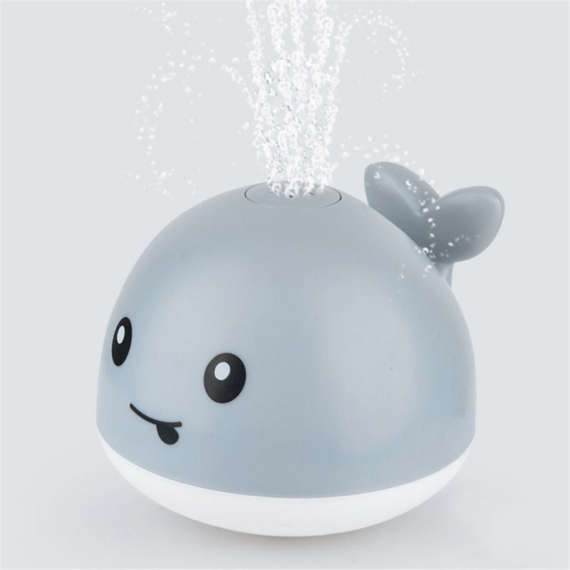Juguete de baño con forma de ballena y lanzador de agua