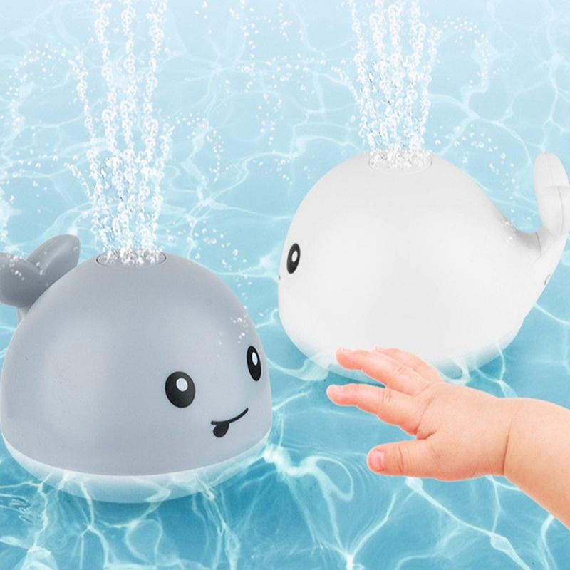 Juguete de baño con forma de ballena y lanzador de agua