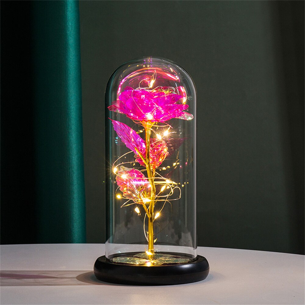 Lámpara con rosa eterna en cúpula de cristal