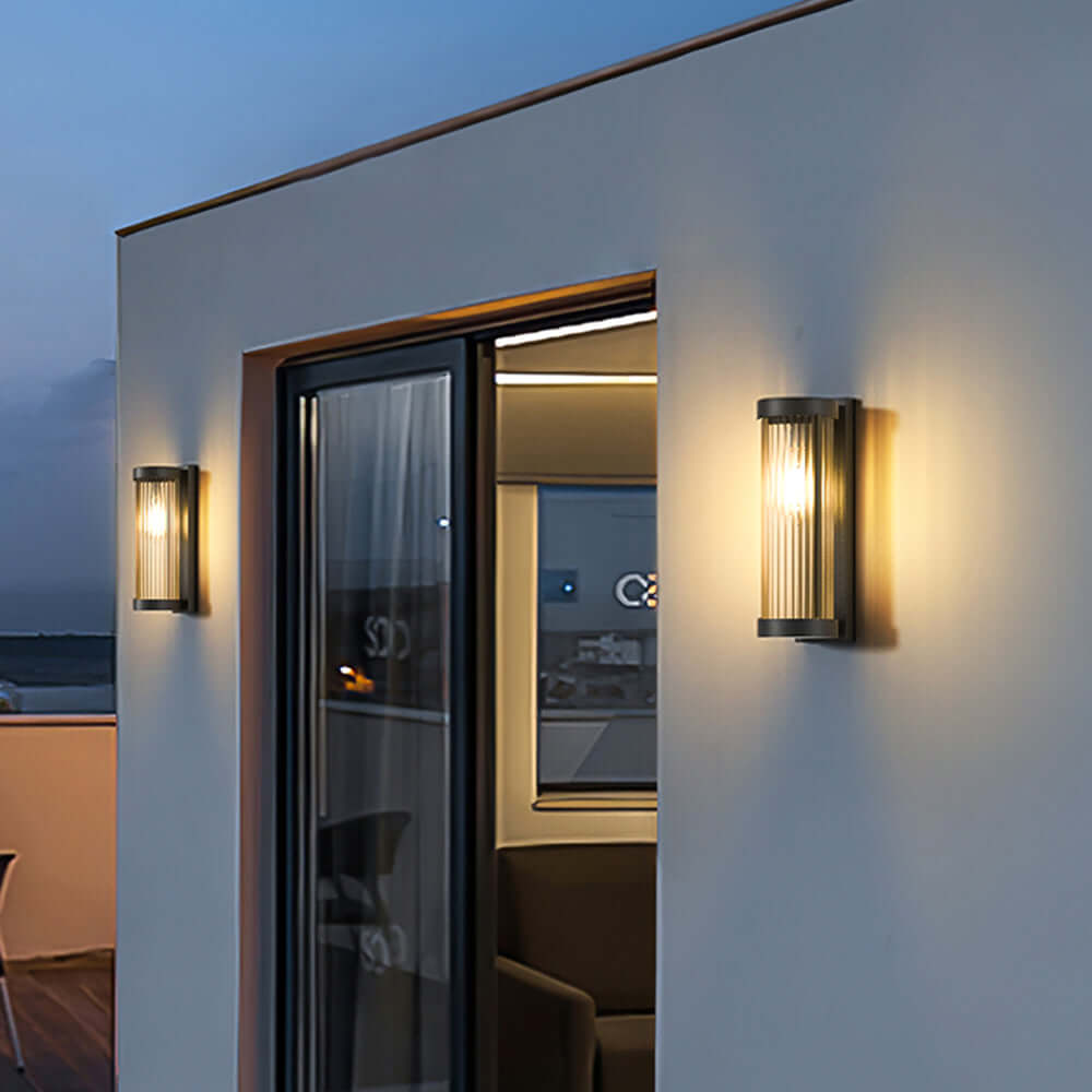 Lámpara solar cilíndrica de exterior en metal y vidrio