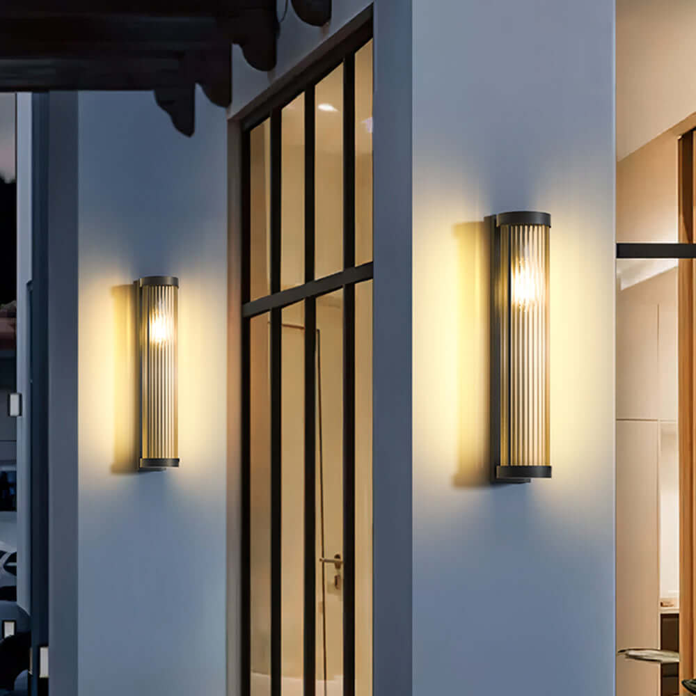 Lámpara solar cilíndrica de exterior en metal y vidrio