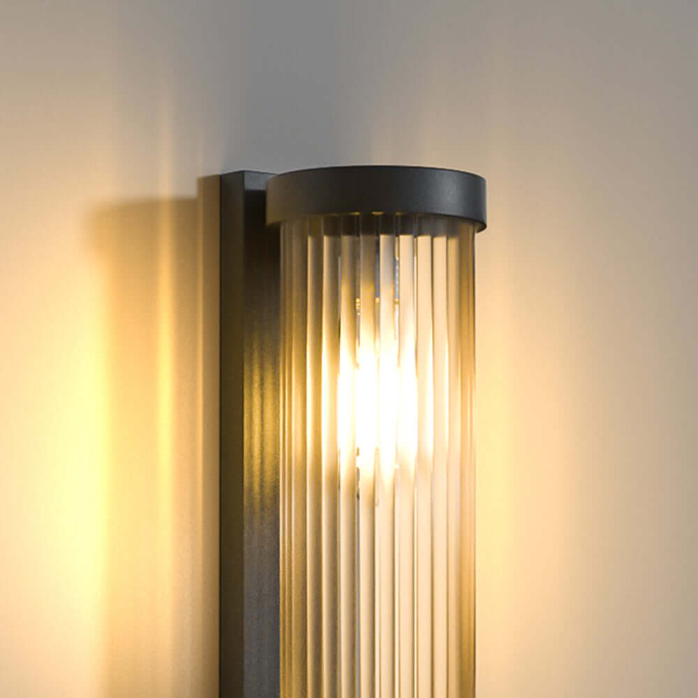 Lámpara solar cilíndrica de exterior en metal y vidrio