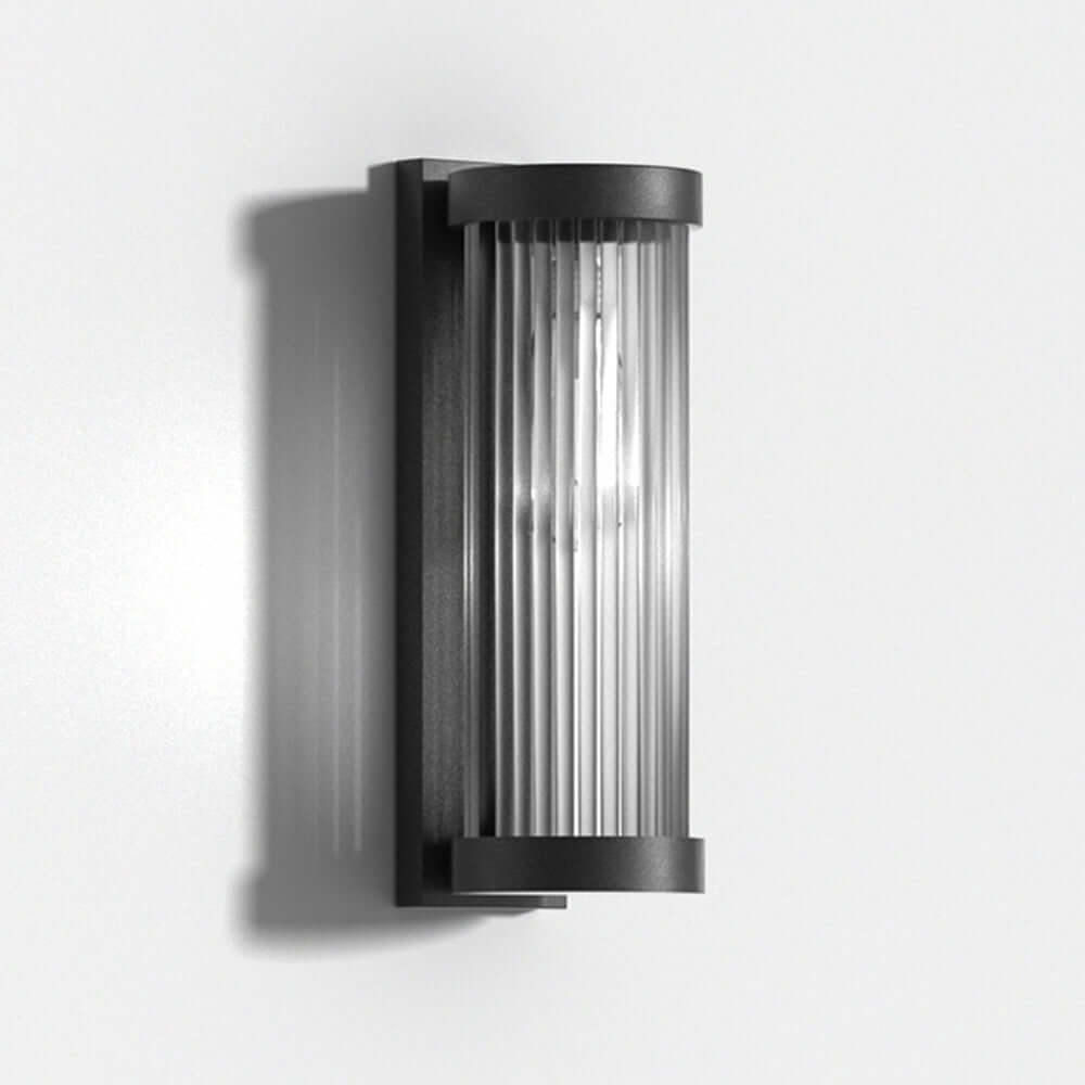 Lámpara solar cilíndrica de exterior en metal y vidrio