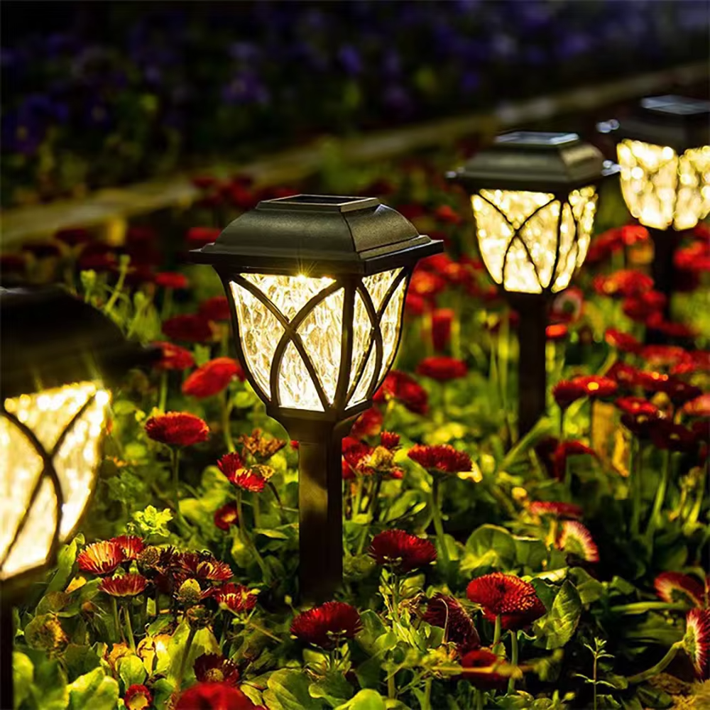 Lámpara solar LED de exterior para jardín y caminos con luz cálida