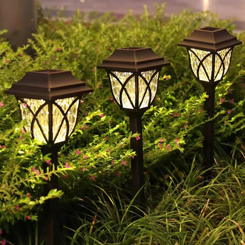 Lámpara solar LED de exterior para jardín y caminos con luz cálida