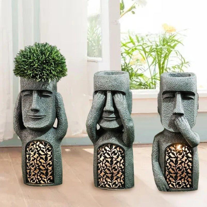 Maceta con Rostro Tallado