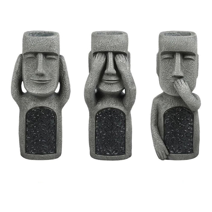 Maceta con Rostro Tallado