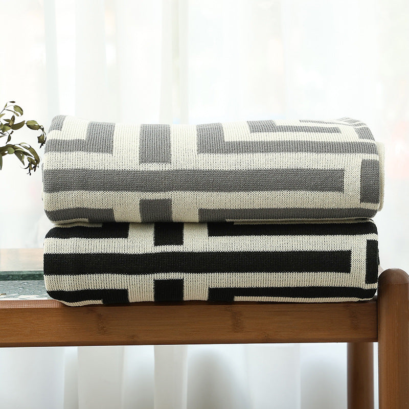 Manta decorativa cálida para mujer con moderno estampado geométrico