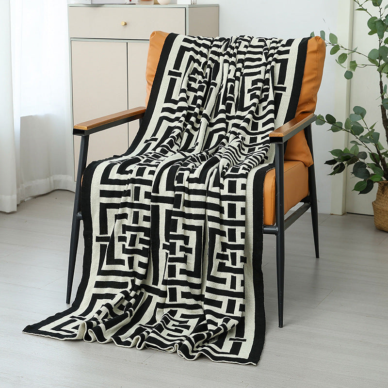 Manta decorativa cálida para mujer con moderno estampado geométrico