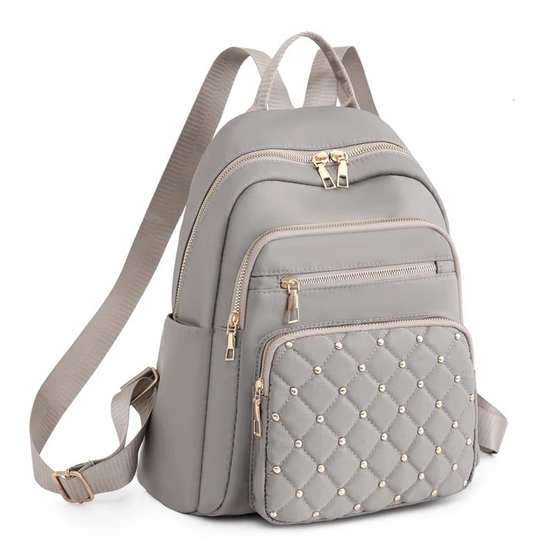 Mochila ligera de nailon resistente al agua para mujer para viajes y uso escolar