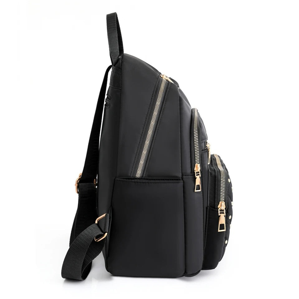 Mochila ligera de nailon resistente al agua para mujer para viajes y uso escolar