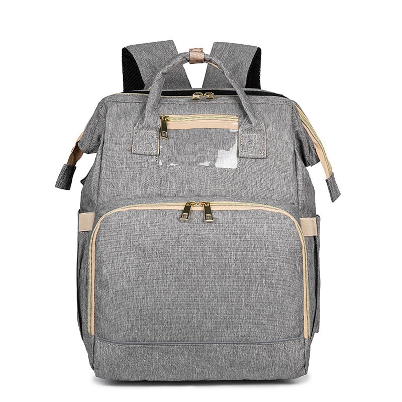 Mochila pañalera con cuna plegable – diseño impermeable con múltiples bolsillos