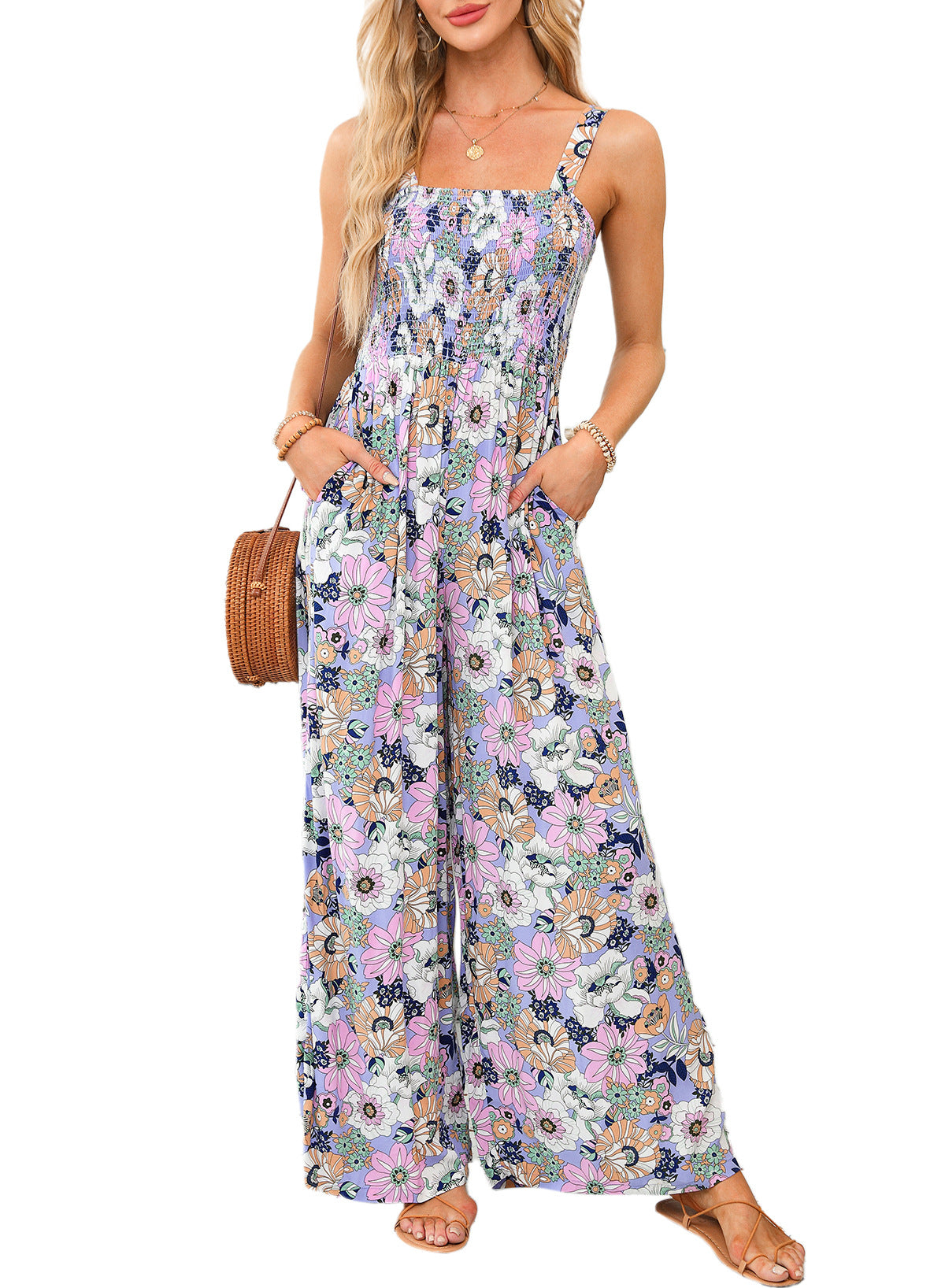 Mono largo de mujer con estampado floral, cuerpo fruncido tipo nido de abeja y pernera ancha