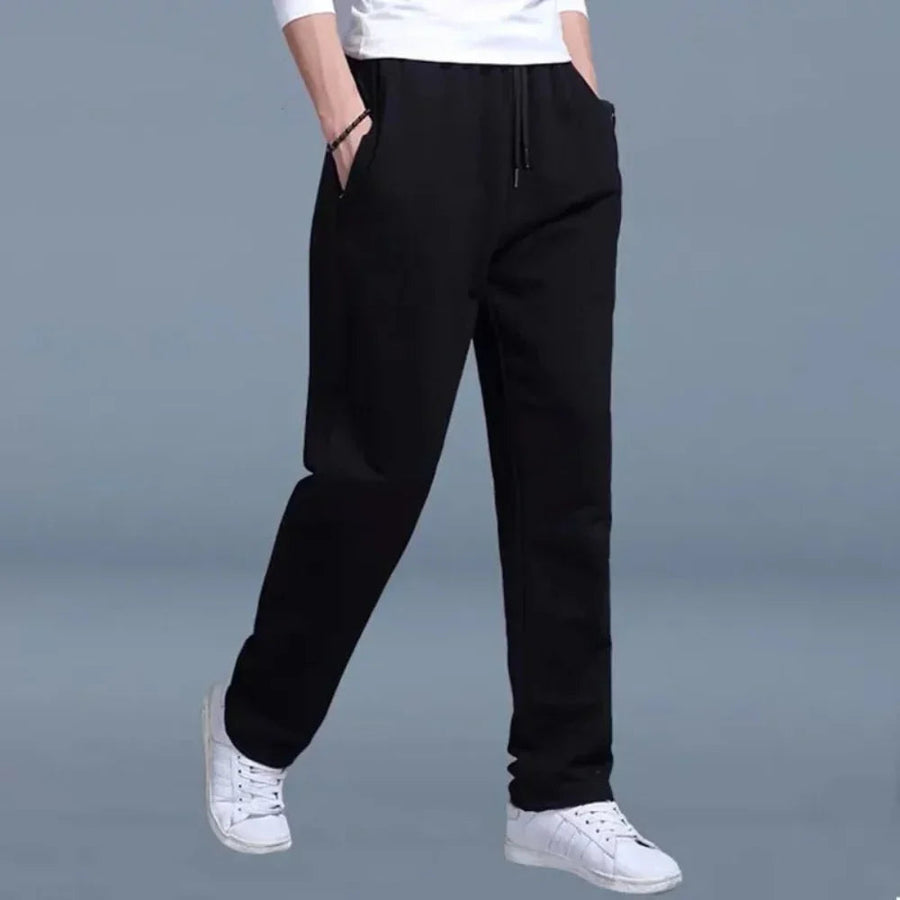 Pantalón de chándal para hombre de corte holgado en tejido mixto transpirable con cintura elástica y bolsillos laterales