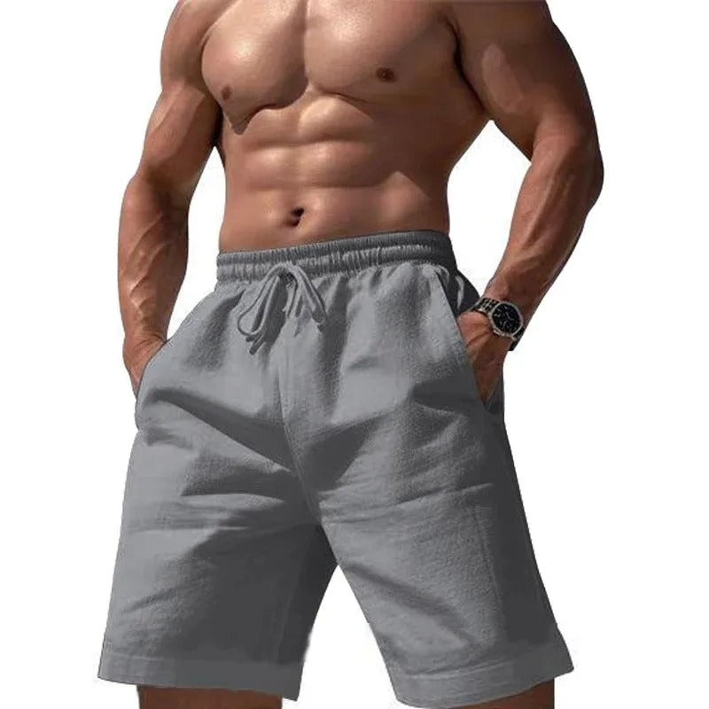 Pantalones cortos elásticos de algodón y lino para hombre