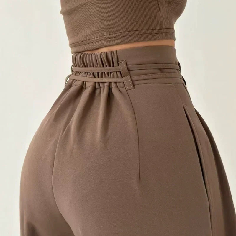 Pantalones de talle alto con pliegues y perneras anchas para mujer