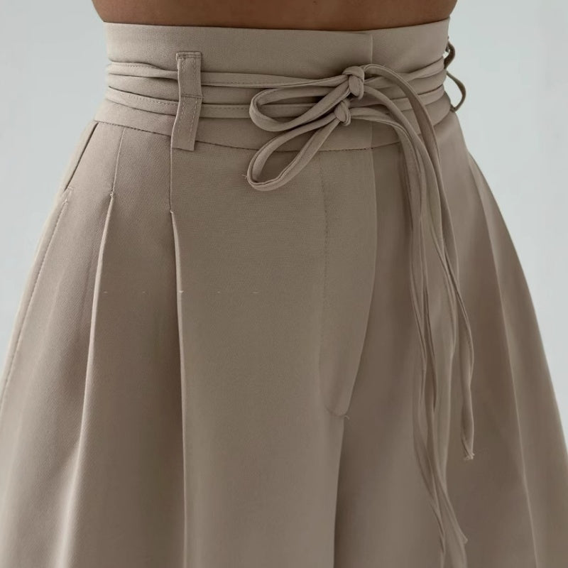 Pantalones de talle alto con pliegues y perneras anchas para mujer