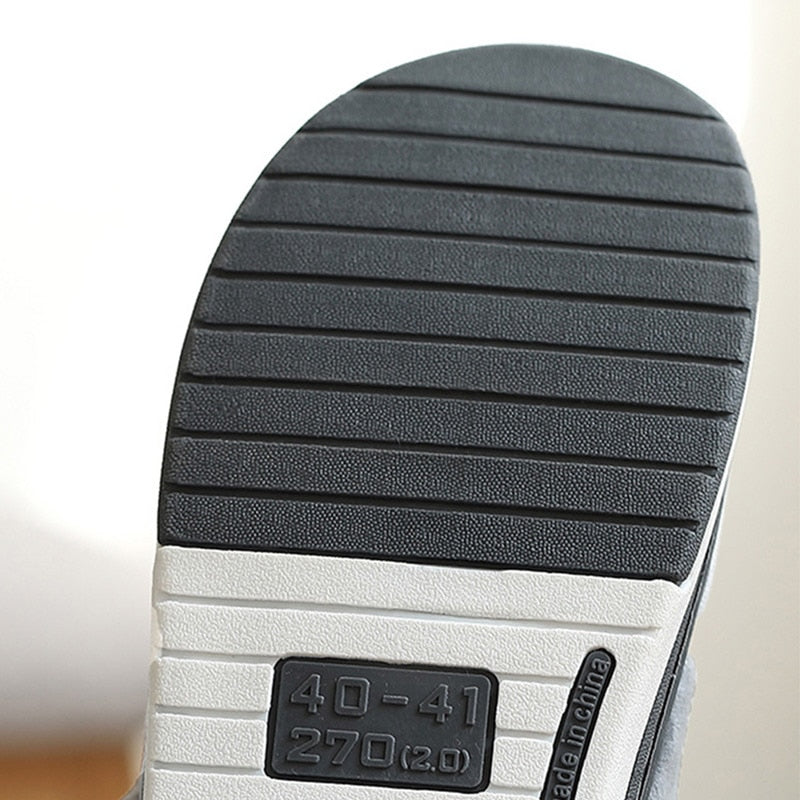 Pantuflas de hombre cálidas y elegantes