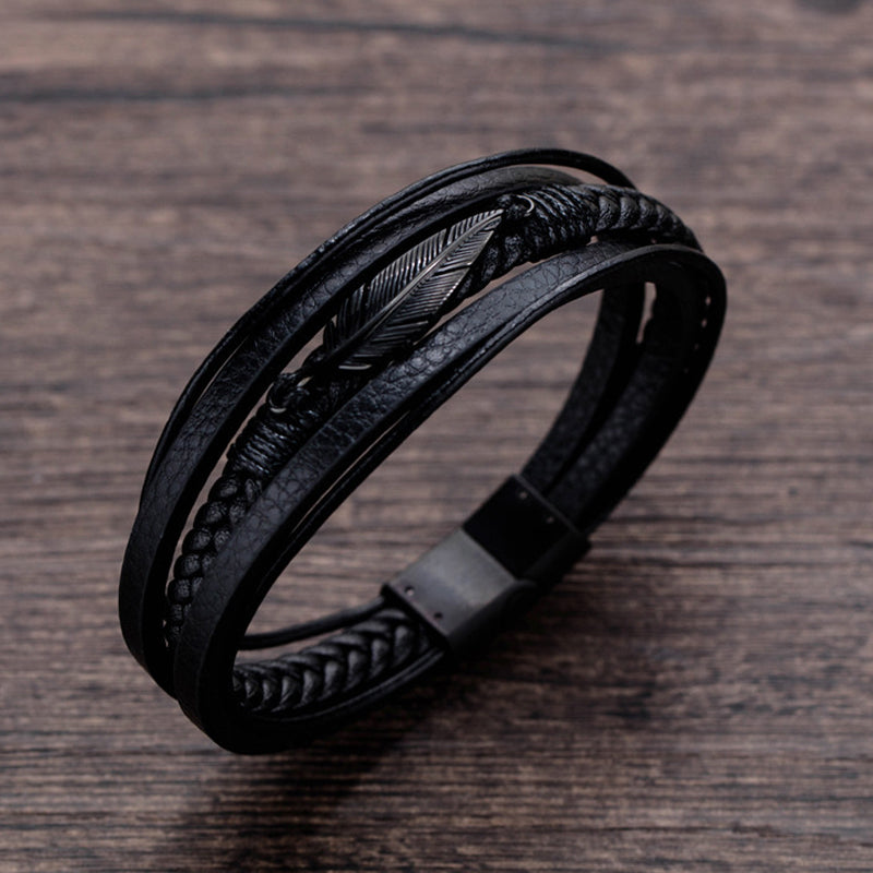 Pulsera con diseño de pluma y acero
