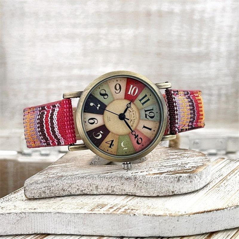 Reloj con esfera de arcoíris multicolor