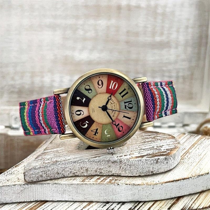 Reloj con esfera de arcoíris multicolor