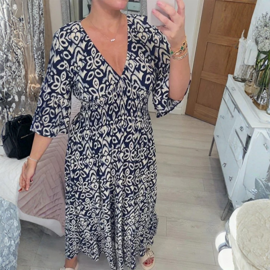 Vestido maxi de verano elegante con estampado, escote en V y caída fluida