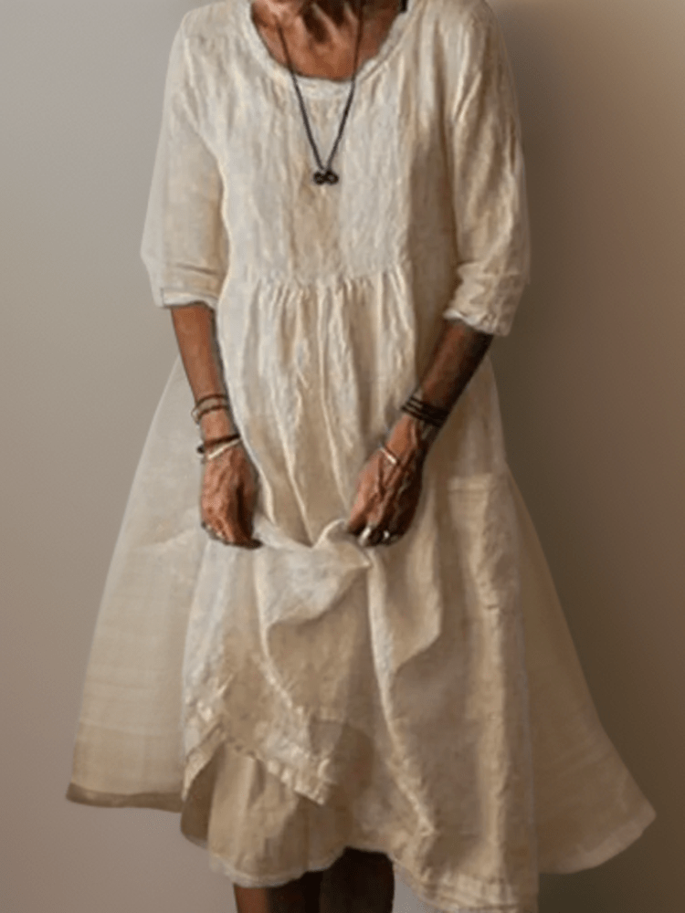 Vestido midi corte A con manga 3/4