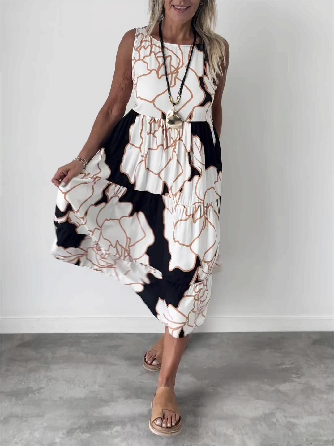 Vestido midi corte A sin mangas con estampado floral
